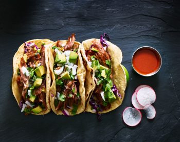 tacos with sauce and garnish